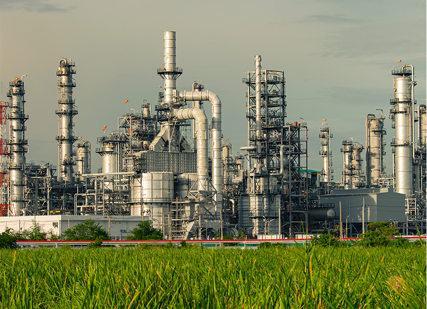 Industrial plant with pipes and towers, rounded corners